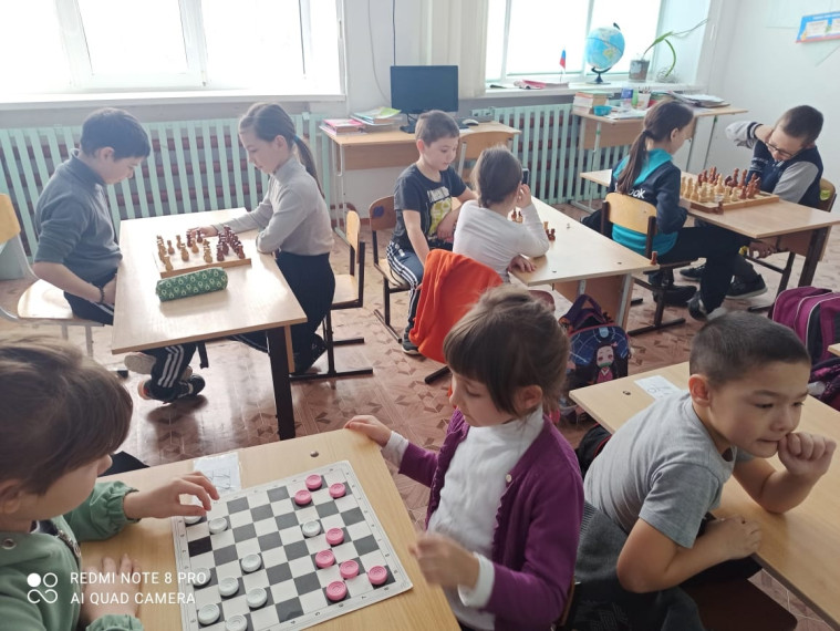 Турнир по шахматам и шашкам.
